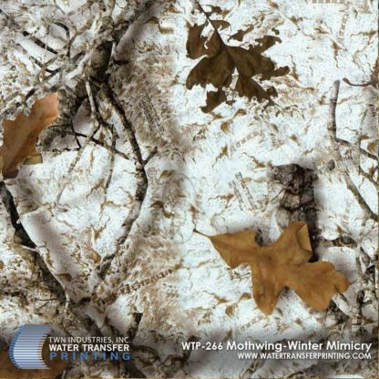 Mothwing Winter Mimicry™ is a winter camouflage that features a white moth wing background with wooded and leaf elements in the foreground. Mothwing™ patterns utilize the same design and camouflaging mechanisms as a moth’s wing.